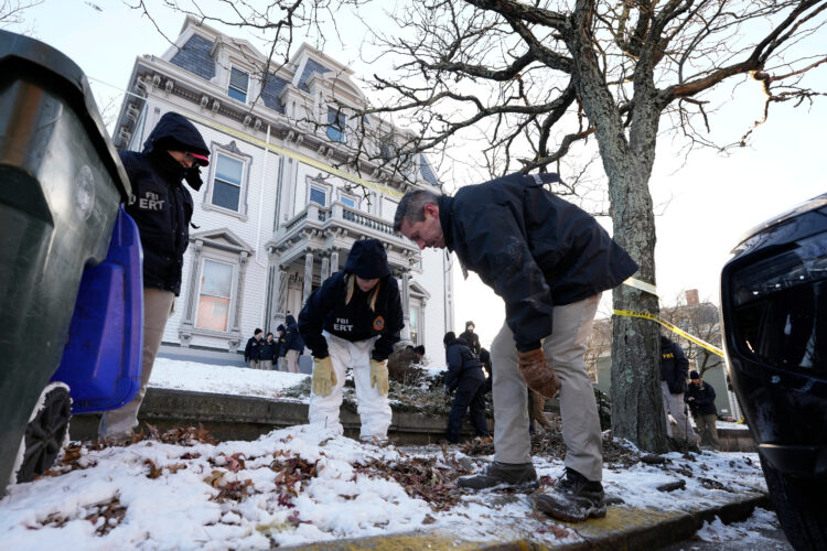 Search for the Brown University shooter continues as questions swirl about campus security